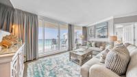 ein Wohnzimmer mit einer Couch und einem Tisch in der Unterkunft St Maarten 907 a Newly Renovated Luxury Beach Front 3 Bedroom 9th Floor Private Elevator in Destin