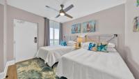 Ein Bett oder Betten in einem Zimmer der Unterkunft St Maarten 907 a Newly Renovated Luxury Beach Front 3 Bedroom 9th Floor Private Elevator