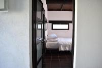 Ein Bett oder Betten in einem Zimmer der Unterkunft MAS MLS