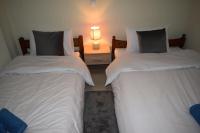 A bed or beds in a room at Deppy's House κοντά στα λουτρά Πόζαρ