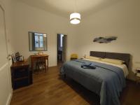 A bed or beds in a room at Maisonvanilla