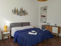 A bed or beds in a room at Maisonvanilla