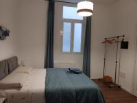 A bed or beds in a room at Maisonvanilla