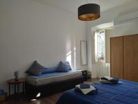 A bed or beds in a room at Maisonvanilla