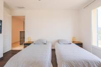 Posteľ alebo postele v izbe v ubytovaní Spacieuse Villa Niçoise au calme avec piscine