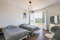 Posteľ alebo postele v izbe v ubytovaní Spacieuse Villa Niçoise au calme avec piscine
