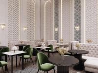 a dining room with tables and green chairs at HOTEL KARVON SHAHRISABZ in Shahrisabz