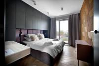 Posteľ alebo postele v izbe v ubytovaní Praga Zupnicza P&O Serviced Apartments