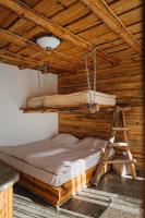 Postel nebo postele na pokoji v ubytování Bedouin Forest Residence