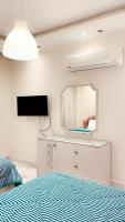 Postel nebo postele na pokoji v ubytování Warm apartment