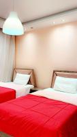 Postel nebo postele na pokoji v ubytování Warm apartment