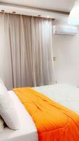 Postel nebo postele na pokoji v ubytování Warm apartment