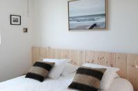Llit o llits en una habitaci&oacute; de Superbe villa premiere ligne Ocean Acces prive a la plage