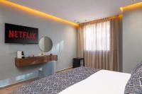 Swiss Continental Hôtelにあるベッド