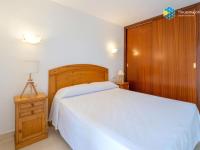 Łóżko lub łóżka w pokoju w obiekcie Apartamento Rosa