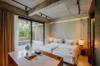 The Komu Canggu Baliにあるベッド