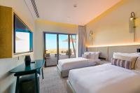 Al Badayer Retreat by Sharjah Collectionにあるベッド