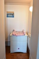 a room with a white dresser with a bed on it at Appartement avec vue 180 sur le Lac Léman in Thonon-les-Bains