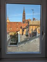 a view of a city from a window at Appartement des Serruriers in Strasbourg