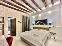 Posteľ alebo postele v izbe v ubytovaní C&O Savoia Deluxe Rooms