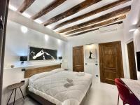 Posteľ alebo postele v izbe v ubytovaní C&O Savoia Deluxe Rooms