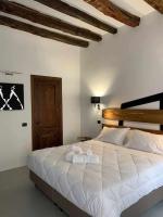 Posteľ alebo postele v izbe v ubytovaní C&O Savoia Deluxe Rooms