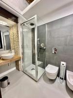 Kúpeľňa v ubytovaní C&O Savoia Deluxe Rooms