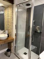 Kúpeľňa v ubytovaní C&O Savoia Deluxe Rooms