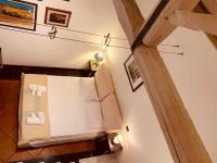 Posteľ alebo postele v izbe v ubytovaní C&O Savoia Deluxe Rooms