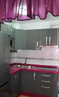 Kuchyňa alebo kuchynka v ubytovaní Apartamento Sirena