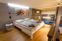 Postel nebo postele na pokoji v ubytování View Skyscraper Bata - loft XL