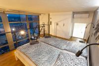 Postel nebo postele na pokoji v ubytování View Skyscraper Bata - loft XL