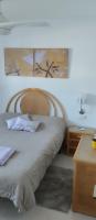 A bed or beds in a room at Apartamento en Port Saplaya
