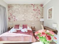 Posteľ alebo postele v izbe v ubytovaní Spa Residence Carbona Mona Lila Apartman