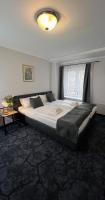 Postel nebo postele na pokoji v ubytování Hotel Boston