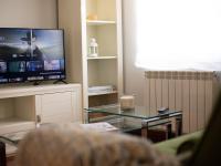 A television and/or entertainment centre at Alojamiento Turistico Zamora 58