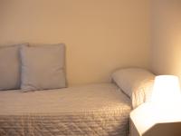 A bed or beds in a room at Alojamiento Turistico Zamora 58