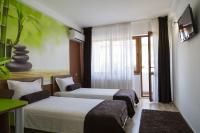Postel nebo postele na pokoji v ubytování Hotel GabriSa