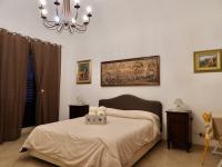 Posteľ alebo postele v izbe v ubytovaní B&B Maria Piddu
