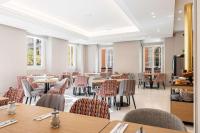 Hôtel Apollinaire Niceにあるレストランまたは飲食店