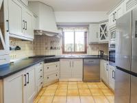 A kitchen or kitchenette at Cubo's Villa Llanos de la Plata