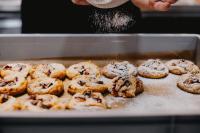 a tray of donuts with chocolate sprinkles on it at Statek Poštolka in Svitavy