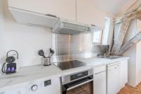 Kuchnia lub aneks kuchenny w obiekcie Charming 2-bedroom apartment at Croisé Laroche