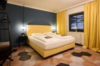 Łóżko lub łóżka w pokoju w obiekcie Boutique House happYellow Saalbach, inkl JokerCard