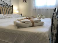 Posteľ alebo postele v izbe v ubytovaní Casa vacanze Borgo marinaro