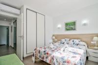 A bed or beds in a room at Assimetric by Rentallorca