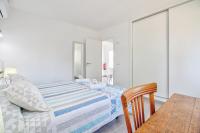 A bed or beds in a room at Assimetric by Rentallorca