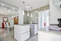 A kitchen or kitchenette at Assimetric by Rentallorca