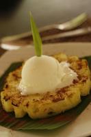 a dessert with a scoop of ice cream on top at The Ananyana Beach Resort by SMS Hospitality in Panglao
