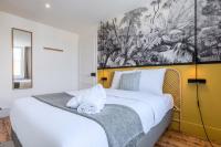 Łóżko lub łóżka w pokoju w obiekcie Bright 3-bedroom 2-bathroom flat